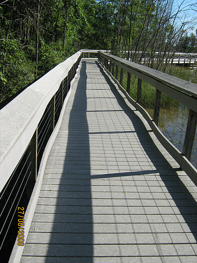 warping composite plastic boardwalk planks resized 600