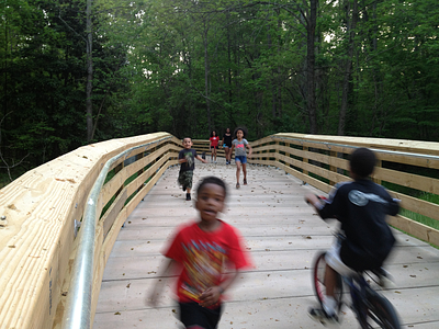 kids on park boardwalk kids on park boardwalk