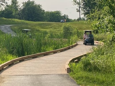 Eisenhower golf cart bridge crossing with cart 1