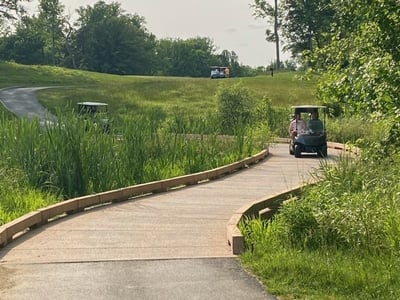 Eisenhower golf cart bridge crossing with cart 1